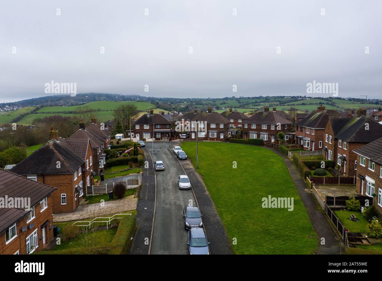 Aerial view, footage of a council housing estate, flats, homes for the ever growing population, immigration and poor areas Stock Photo