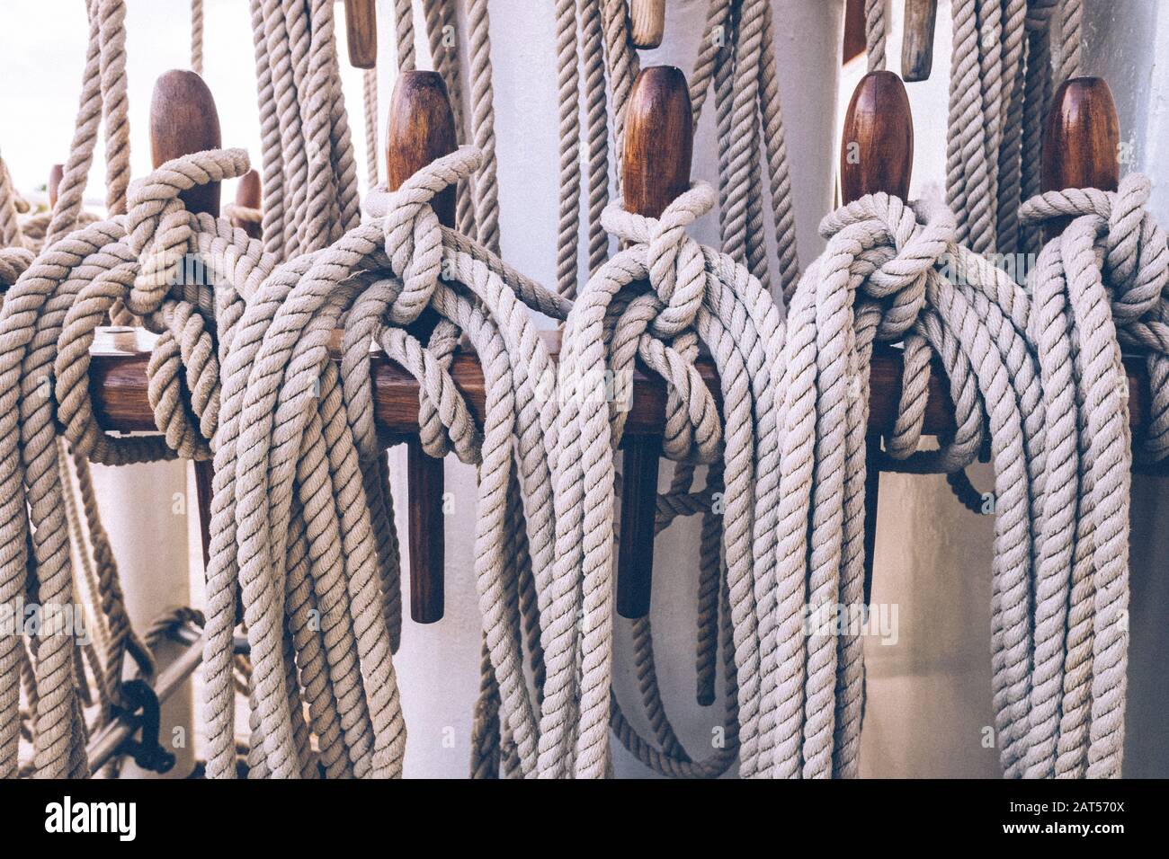 Ship ropes tied to the mast before lowering sails Stock Photo Alamy