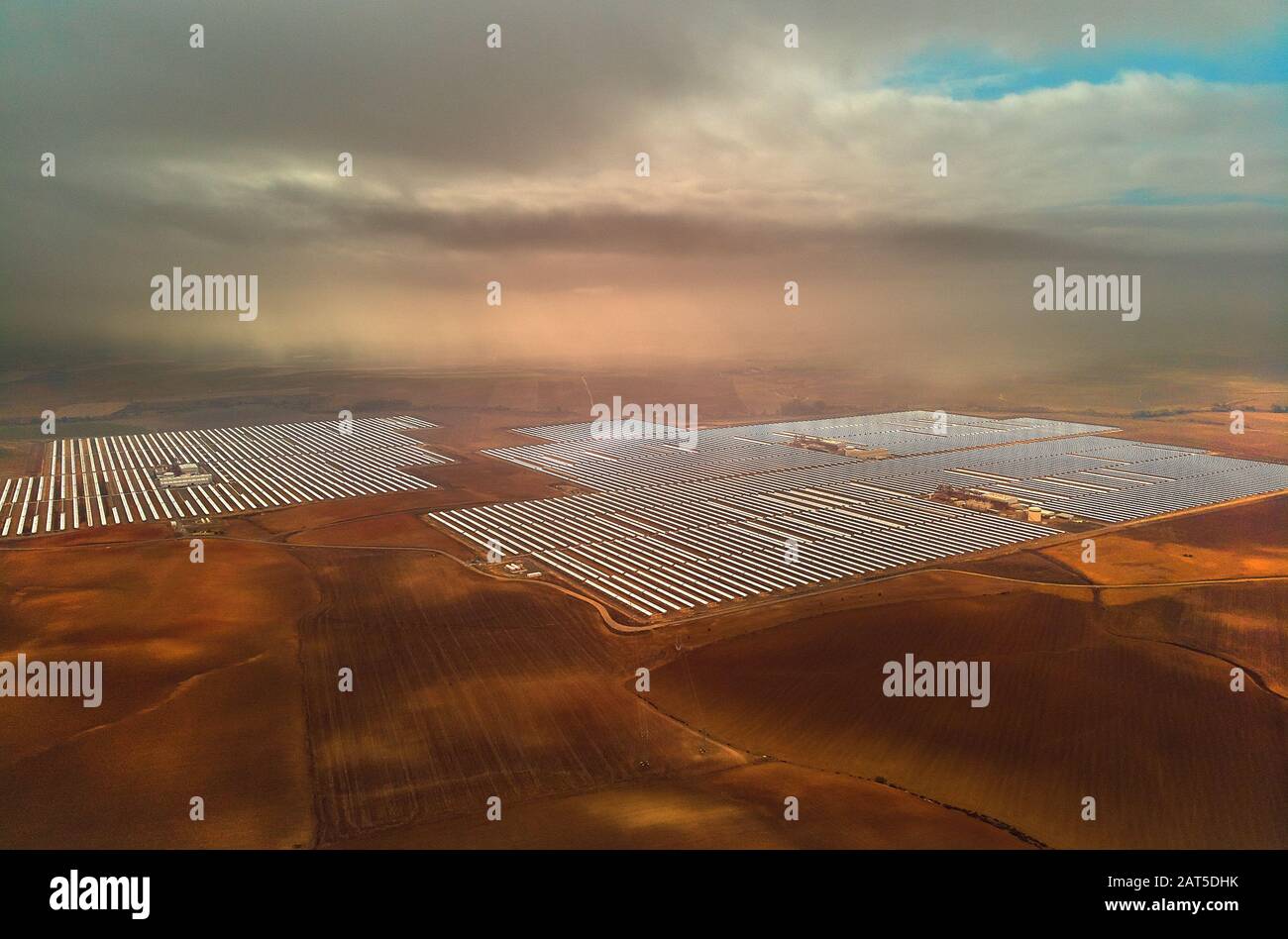 Aerial image drone point of view photo Gemasolar Concentrated solar power plant CSP, system generate solar power. Sevilla, Spain Stock Photo