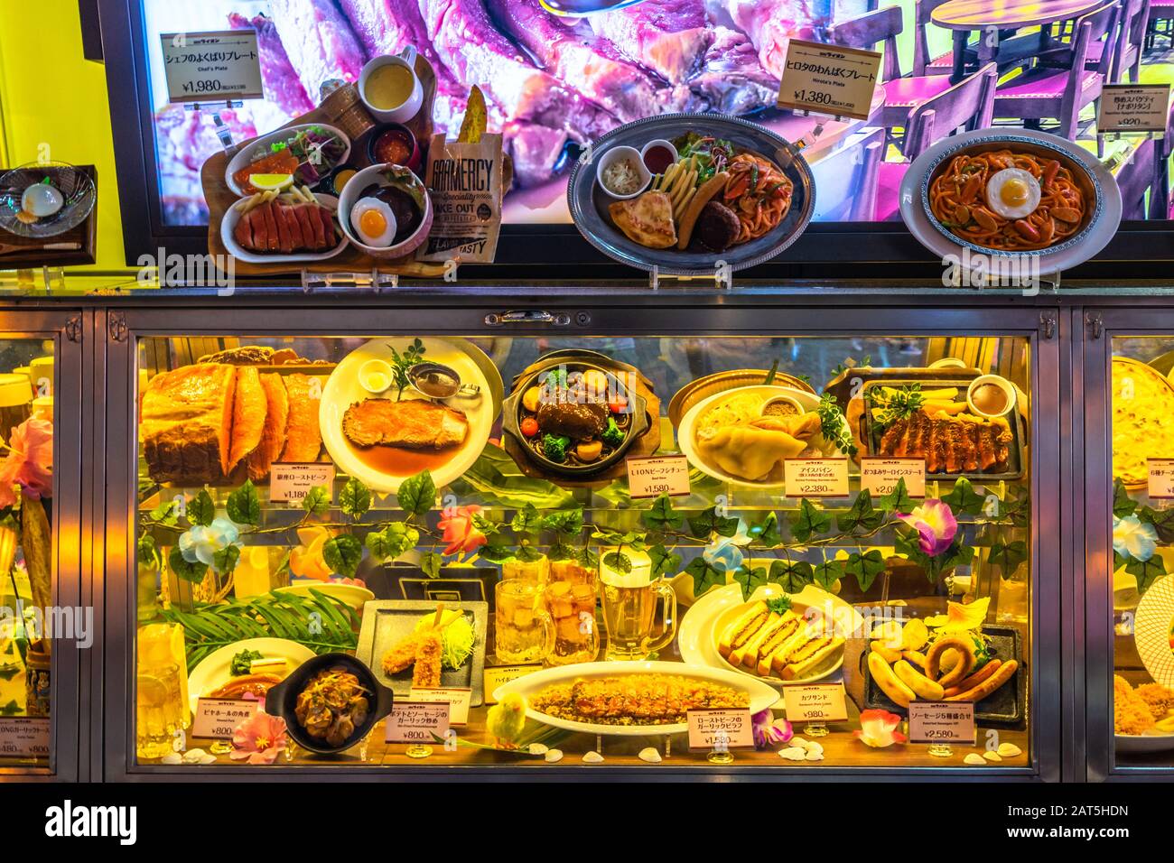 Model food dishes (sampuru) displayed in a restaurant. Showing fake food is common in many Japanese restaurants Stock Photo