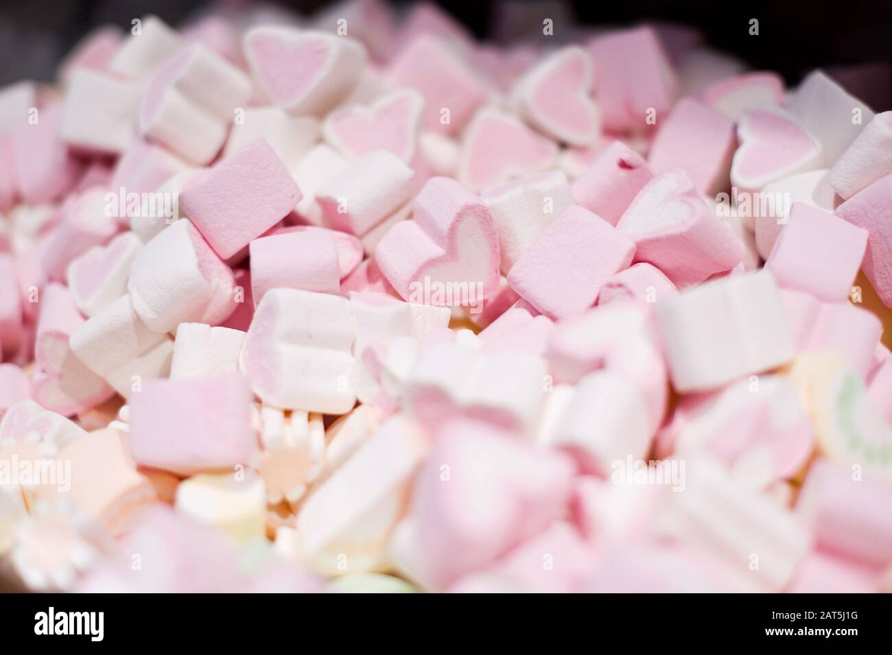Pink heart shaped marshmallows on white background Stock Photo by ©jeehyun  53543645