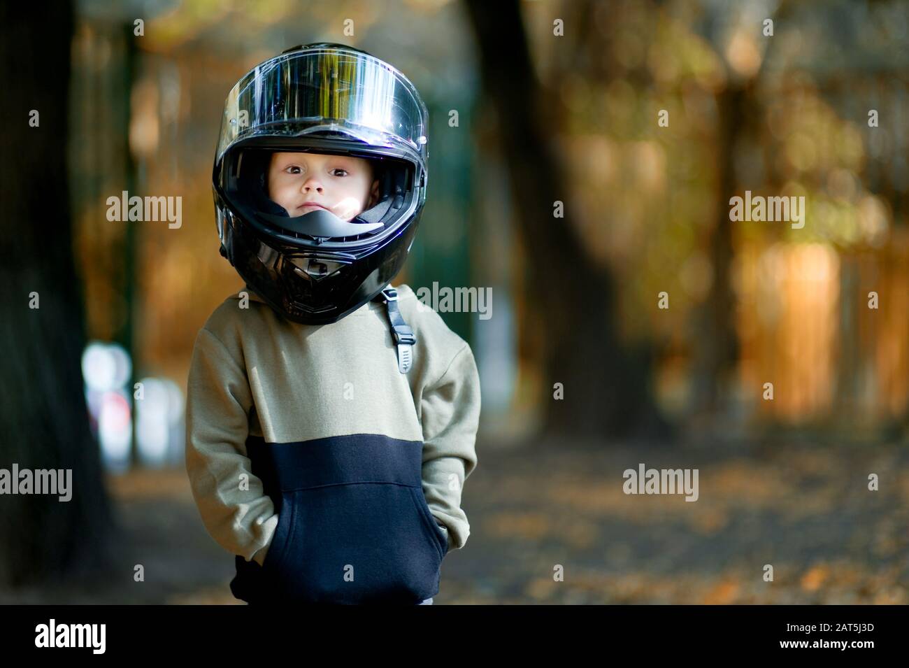 A Child With A Motorcycle Helmet High Resolution Stock Photography And Images Alamy