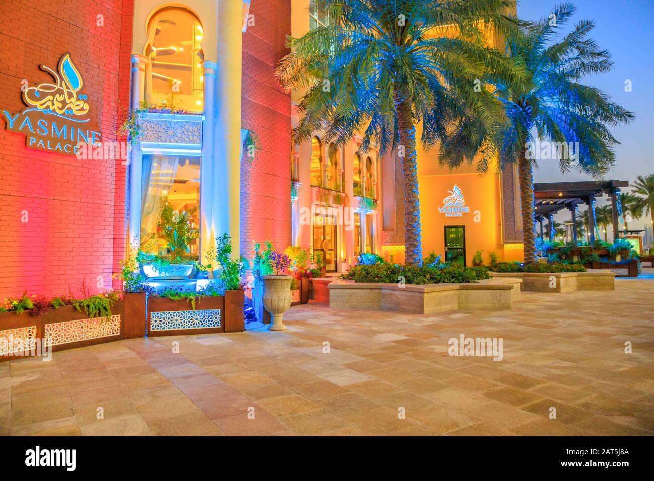 Doha, Qatar - February 18, 2019: entrance of Arab restaurant Yasmine Palace on corniche marina promenade in Porto Arabia at the Pearl-Qatar Stock Photo
