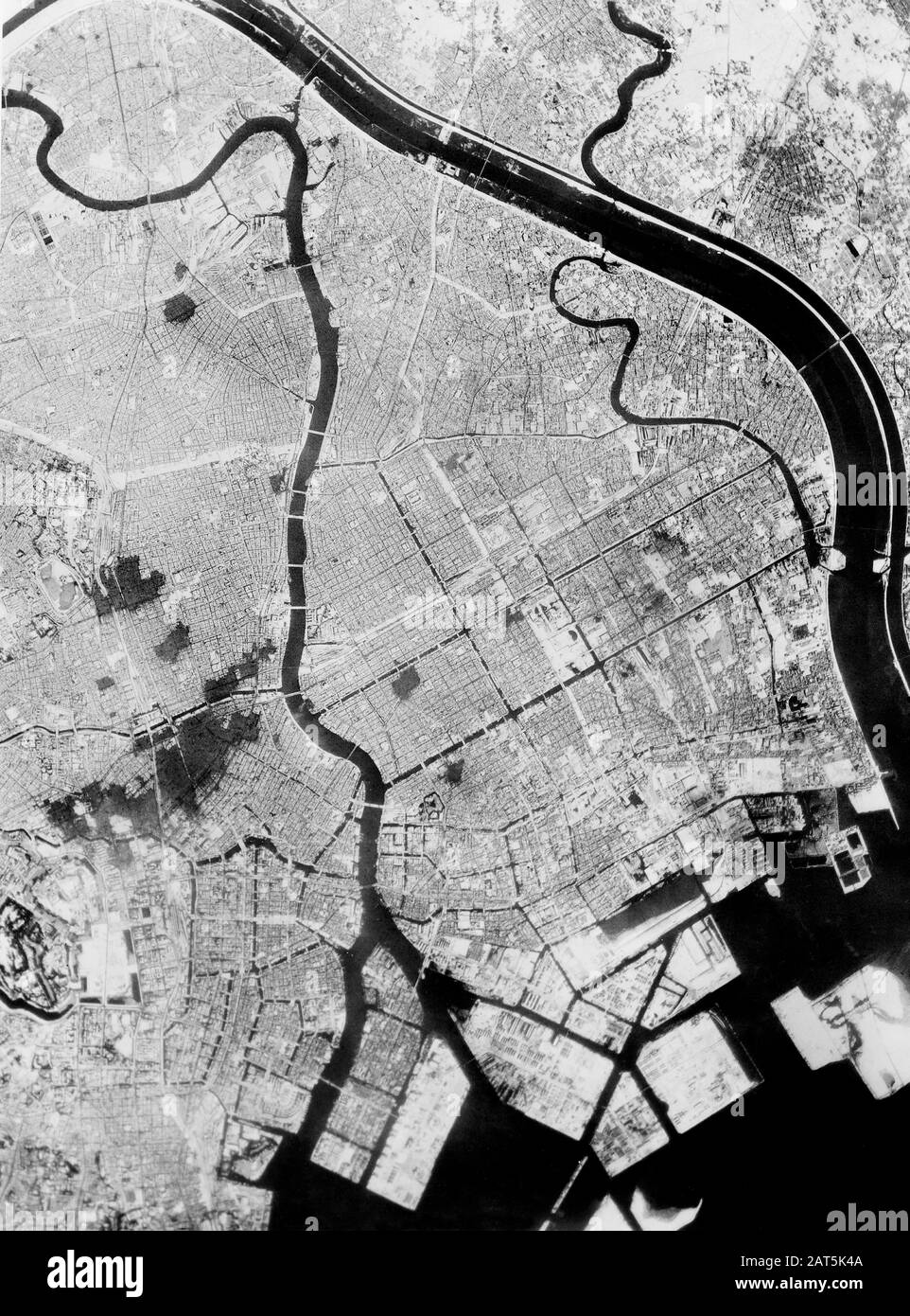 Aerial View showing effects of first large-scale incendiary bombing attack by U.S. 20th Air Force Operations, Tokyo, Japan, 1945 Stock Photo