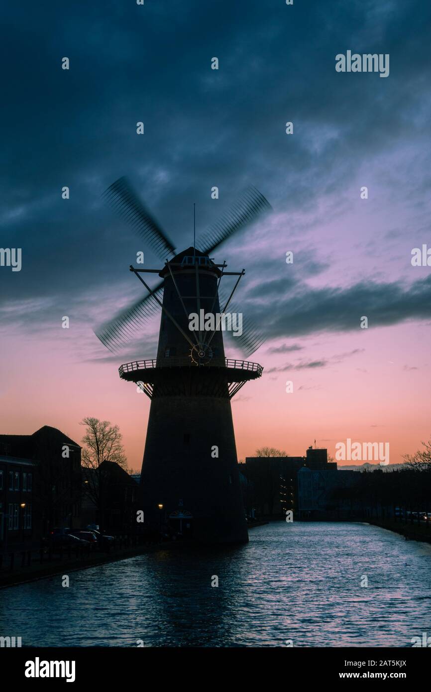 Beautiful windmills in Schiedam province South Holland, these highest windmills in the world also known as burner mills were used for grinding grain t Stock Photo