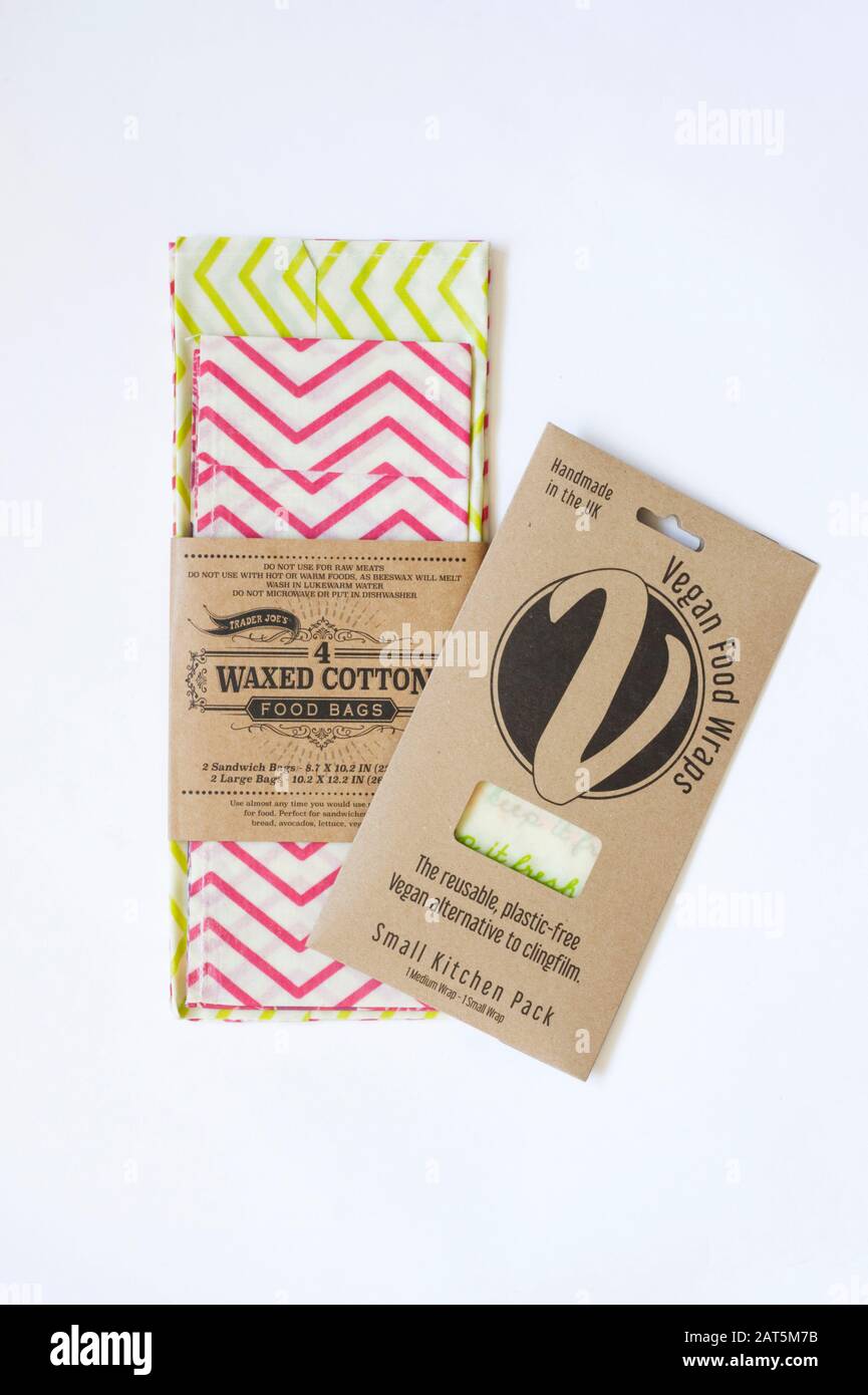 Waxed cotton food bags and vegan food wraps on a white background. Stock Photo