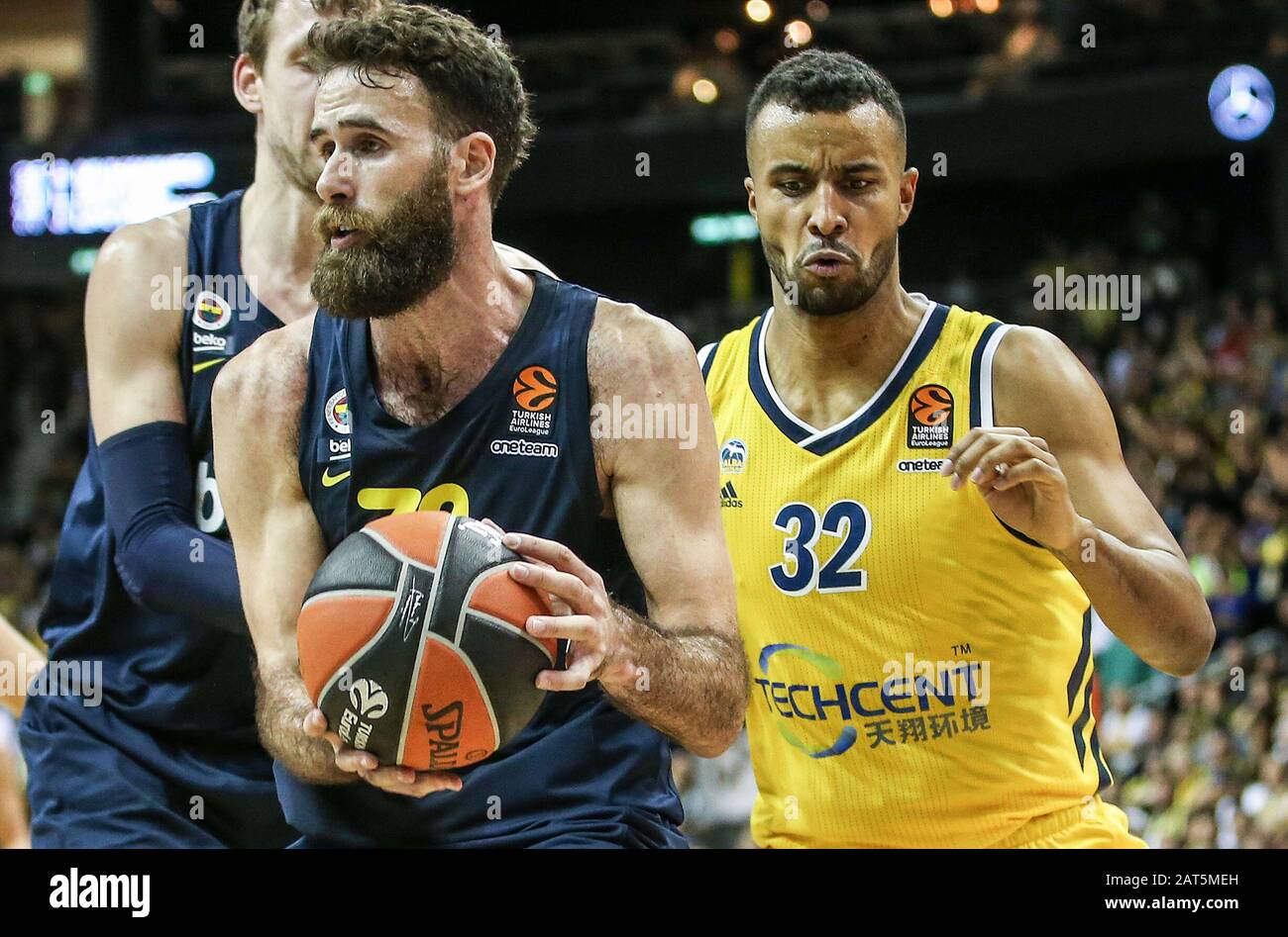 Berlin, Germany. 30th Jan, 2020. Basketball: Euroleague, Alba Berlin -  Fenerbahce Istanbul, main round, 22nd matchday, Mercedes Benz Arena. Luigi  Datome (l) from Fenerbahce Istanbul is being followed by ALBA's Johannes  Thiemann.