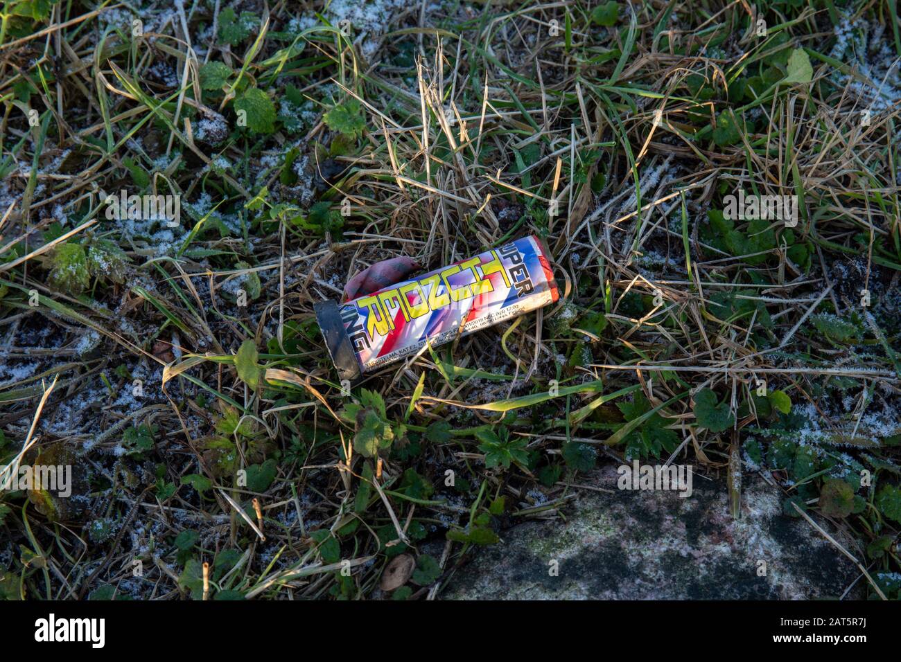 Fired Super Thunder King firework left in nature after New Year's party Stock Photo