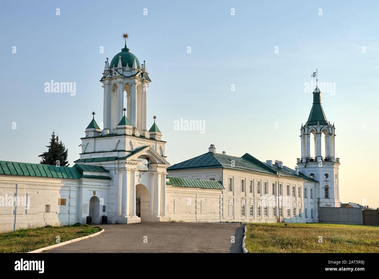 = North Monastery Wall with Entrance Gate at Sunset in Summer (angled view) =  An angle view of the northern part of the wall of the Spaso-Yakovlevsky Stock Photo