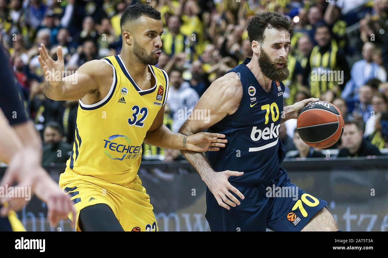 Berlin, Germany. 30th Jan, 2020. Basketball: Euroleague, Alba Berlin -  Fenerbahce Istanbul, main round, 22nd matchday, Mercedes Benz Arena. Luigi  Datome (r) from Fenerbahce Istanbul fights against ALBA's Johannes Thiemann  for the