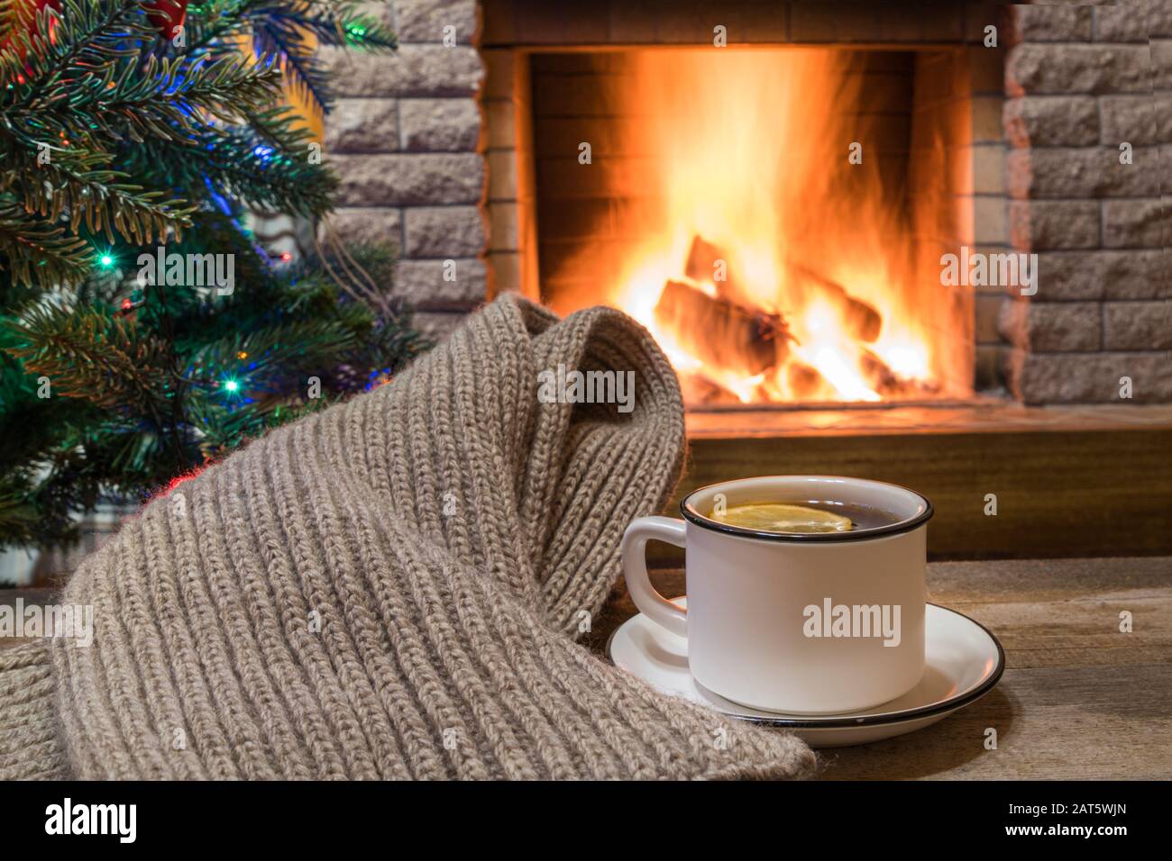 Cozy Scene Before Fireplace And Christmas Tree Decorated Toys And