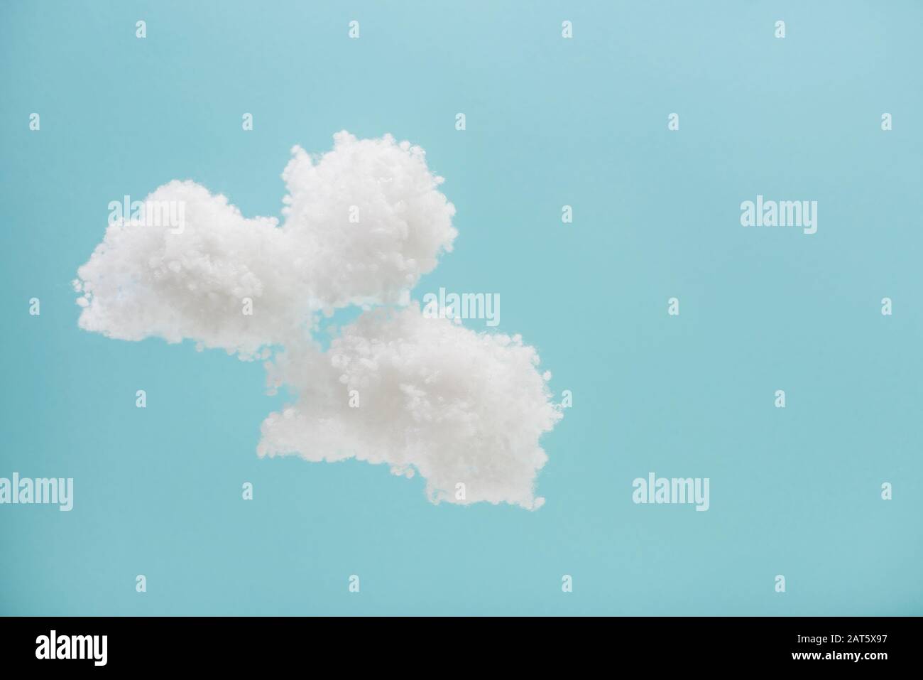 White cotton wool clouds on blue background Stock Photo - Alamy