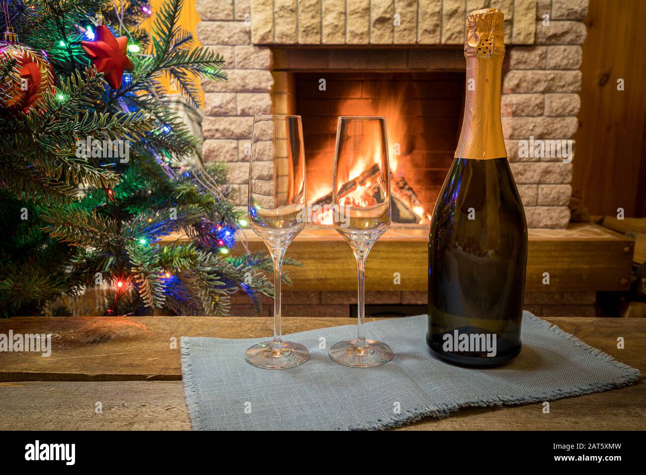 Christmas Eve Two Empty Glasses Of Champagne Wine And A Bottle