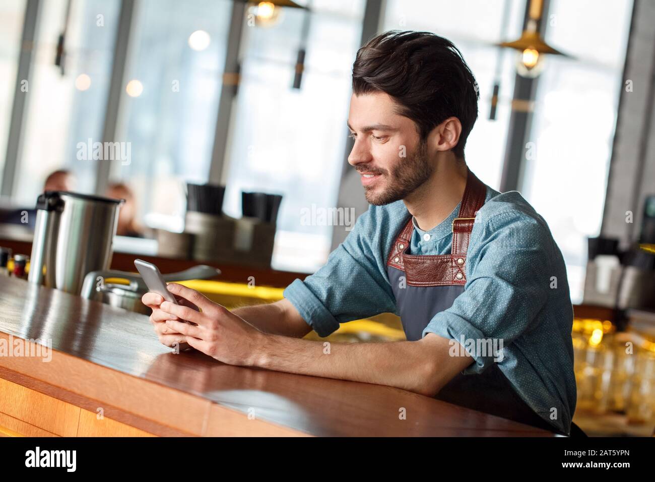 Bartender Leaning On Counter High Resolution Stock Photography and ...