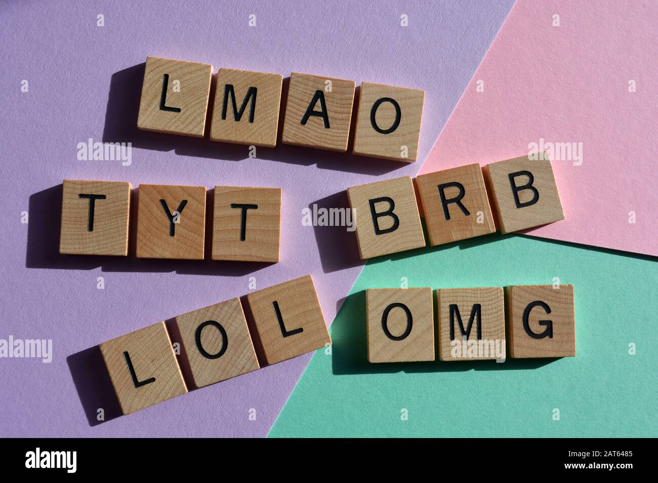 Internet slang, acronyms including BRB, Be Right Back, LOL, Lots of Laughs, OMG, Oh My God, and TYT, Take Your Time Stock Photo