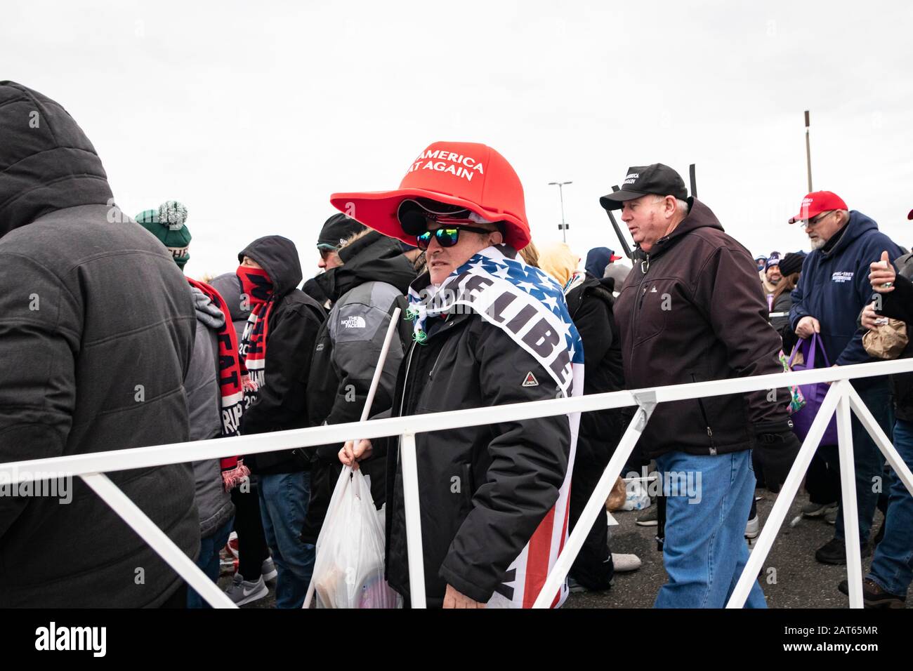 People wait outside near the New Jersey shore boardwalk - to enter the "Keep America Great" rally held at the Wildwoods Convention Center. Stock Photo