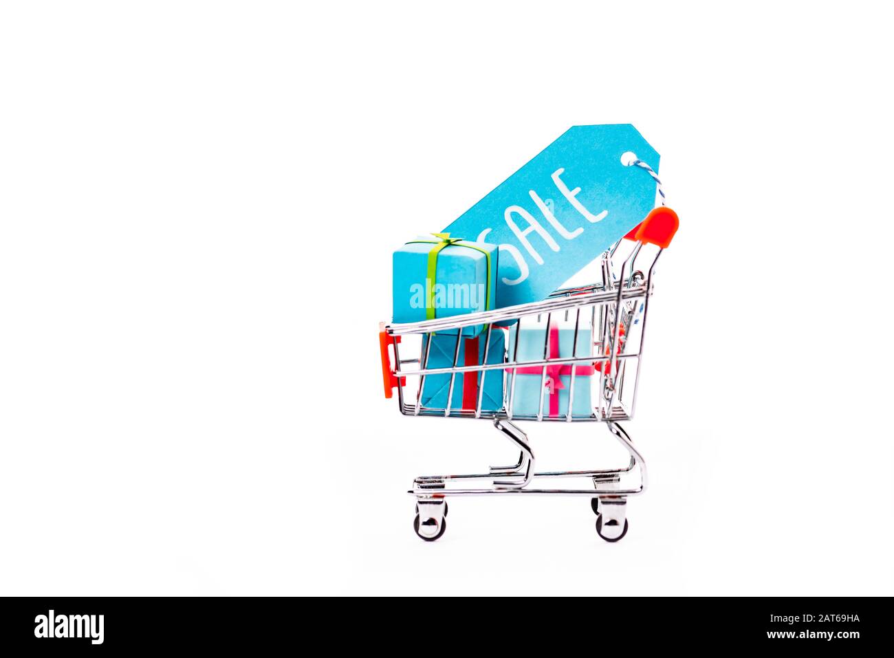 decorative small shopping cart with gift boxes and price tag with sale ...