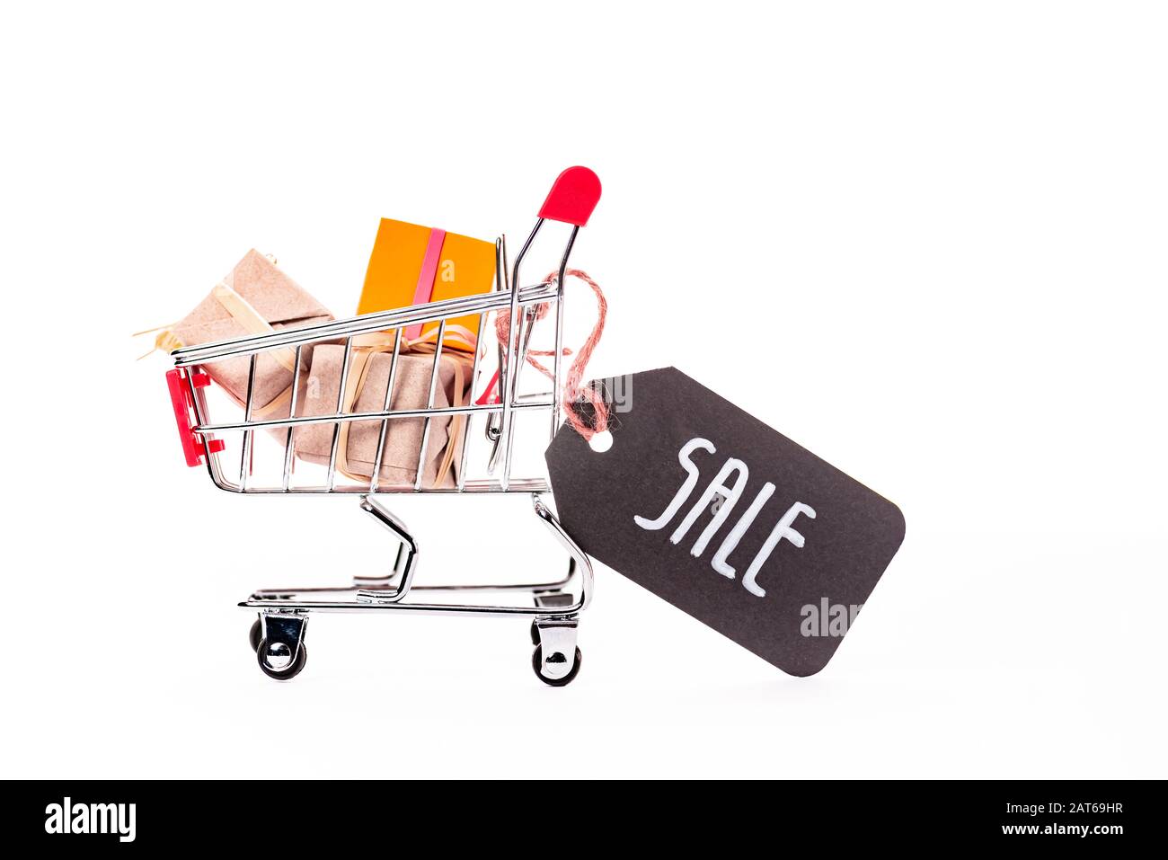 decorative small shopping cart with gift boxes and price tag with sale ...