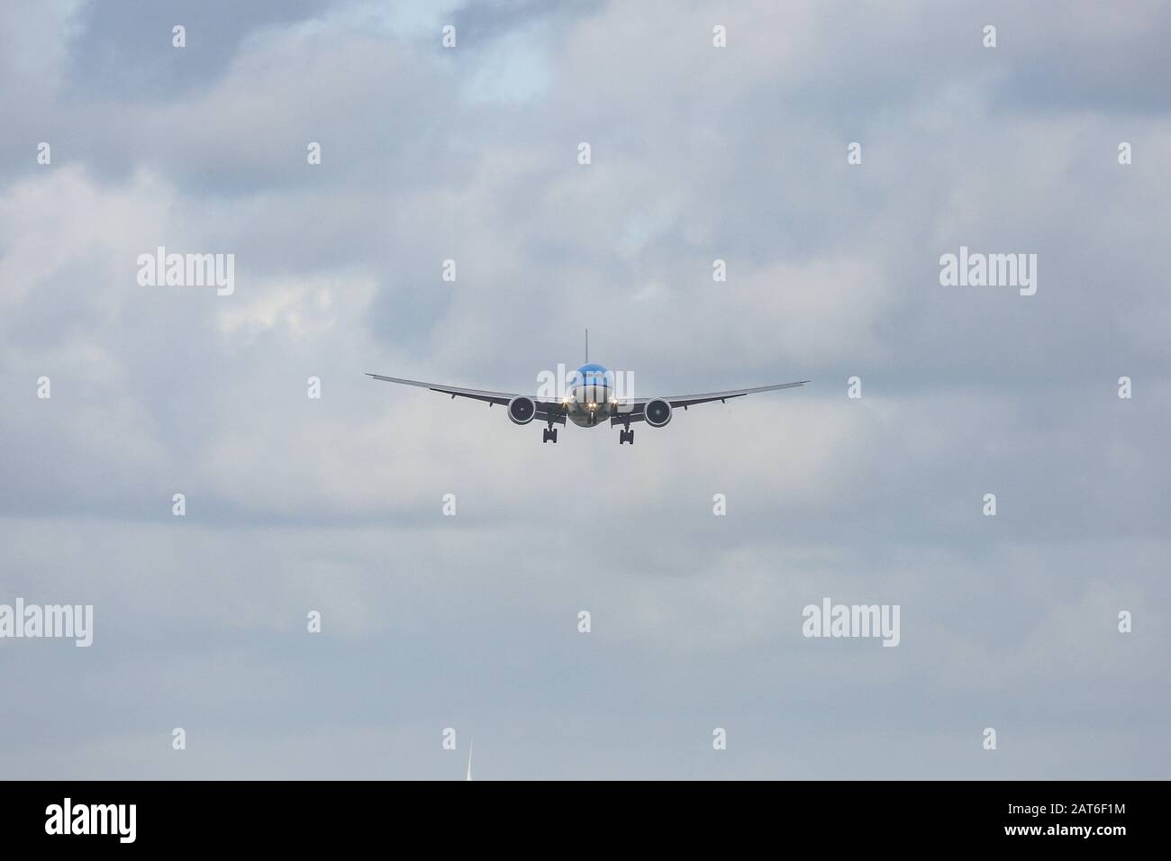 Amsterdam, Netherlands. 26th Jan, 2020. A KLM Royal Dutch Airlines Boeing 777-300 wide-body aircraft lands at Amsterdam Schiphol AMS EHAM Airport in the Netherlands at Polderbaan runway. The airplane has ETOPS certification for transatlantic flight. Credit: Nik Oiko/SOPA Images/ZUMA Wire/Alamy Live News Stock Photo