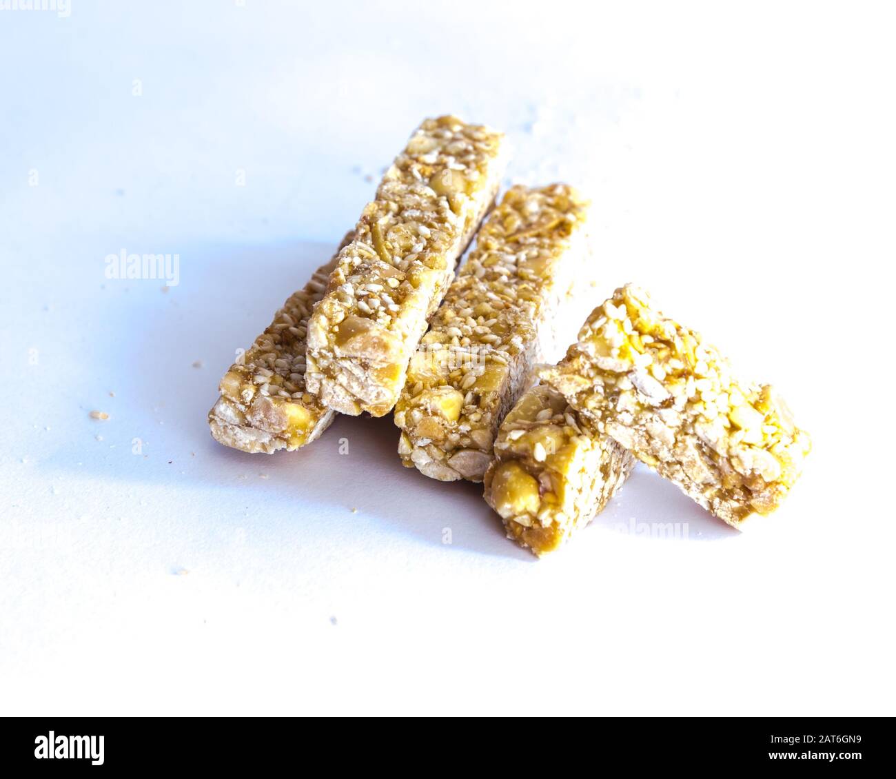 Pile of traditional Vietnamese peanut candy bars Keo Lac isolated Stock Photo Alamy