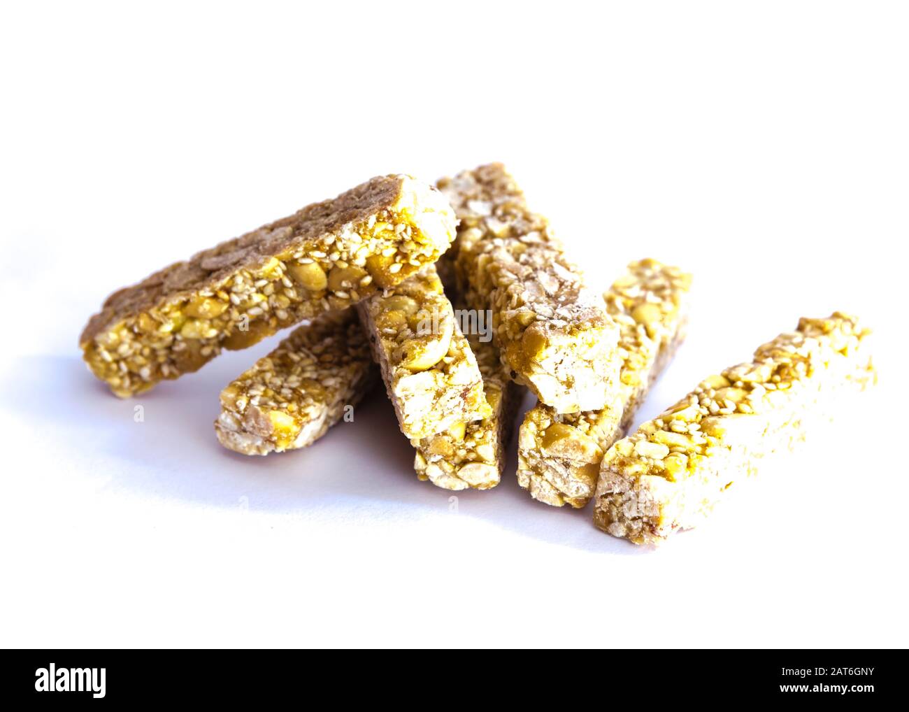 Pile of traditional Vietnamese peanut candy bars Keo Lac isolated Stock