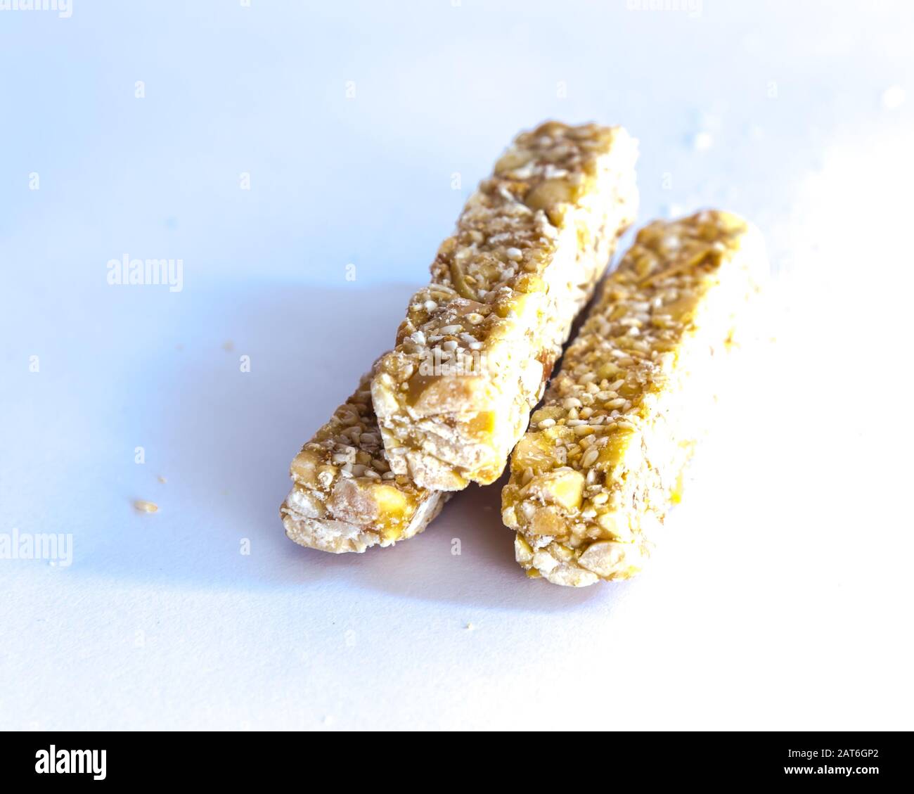 Pile of traditional Vietnamese peanut candy bars Keo Lac isolated Stock Photo Alamy