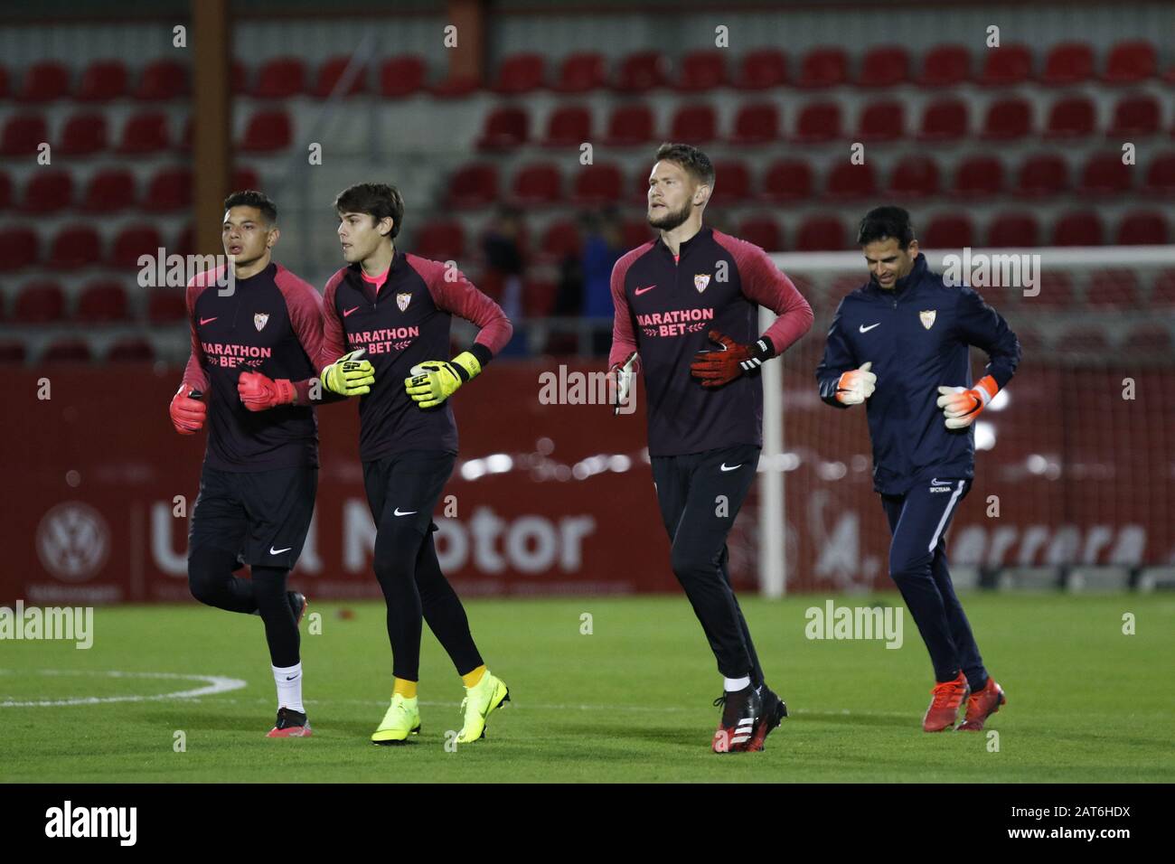 Miranda De Ebro, Burgos, SPAIN. 30th Jan, 2020. Sevilla FC goalkeepers JAVI DIAZ (with yellow gloves) and VACLÃK (with red gloves) warming up before the game between Mirandes and Sevilla. The CD Mirandes, La Liga SmartBank team, hosted Sevilla FC for the 1/8 Copa del Rey match at Anduva stadium, in Miranda de Ebro. Credit: Edu Del Fresno/ZUMA Wire/Alamy Live News Stock Photo