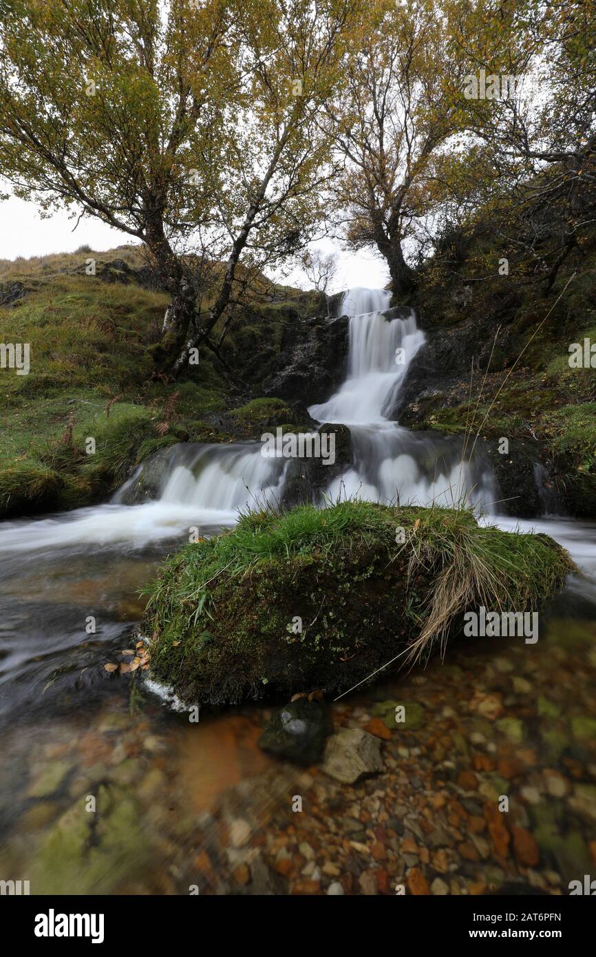 Rural waterfall near Ardvreck Castle in the northwestern Highlands of Scotland Stock Photo