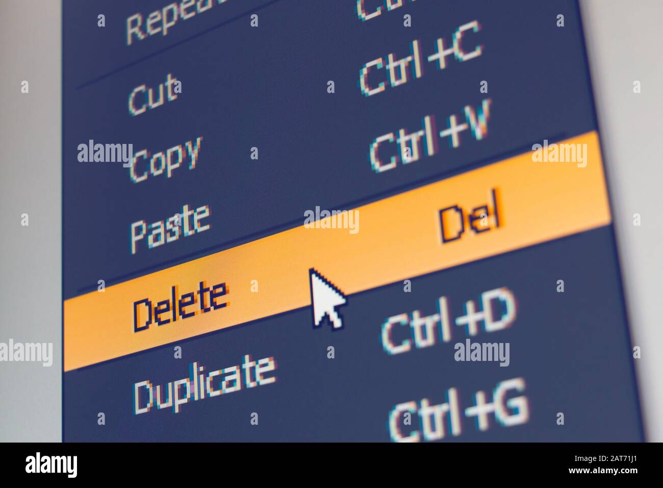 Software menu item with delete command highlighted and mouse cursor selected it, macro shot Stock Photo