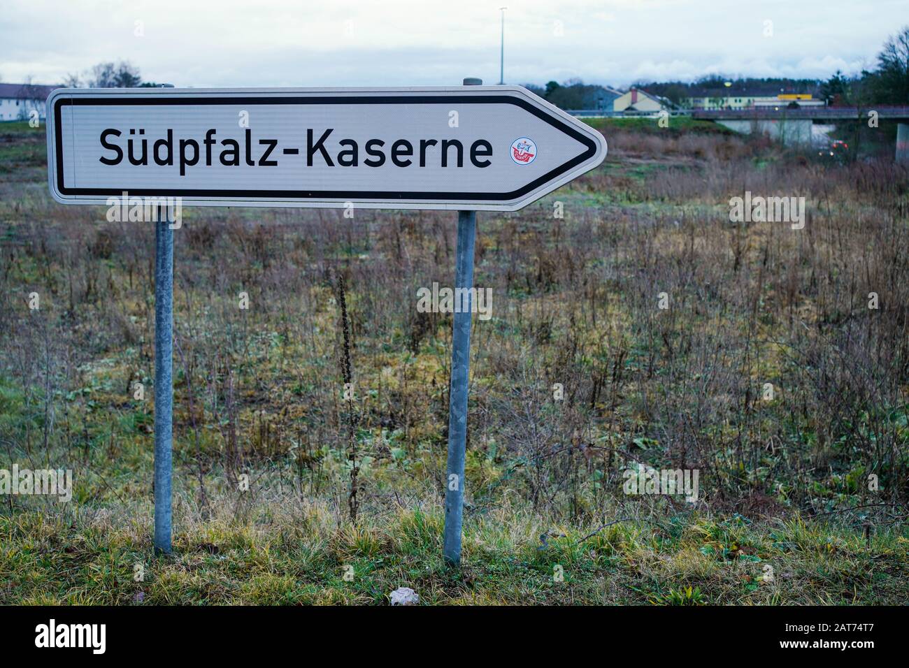 Germersheim, Germany. 31st Jan, 2020. A sign with the inscription "Südpfalz-Kaserne" is located on a field in front of the area of the Südpfalz-Kaserne. The German government is planning the return flight of the Bundeswehr for Germans and their relatives from the Chinese province of Hubei, which is most severely affected by the coronavirus. The returnees will be accommodated centrally at the Germersheim airbase in Rhineland-Palatinate. Credit: Uwe Anspach/dpa/Alamy Live News Stock Photo