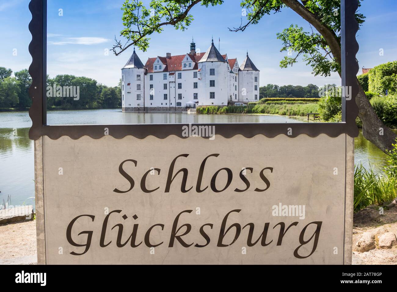 Sign with the German text 'Castle Glucksburg' in Schleswig-Holstein, Germany Stock Photo