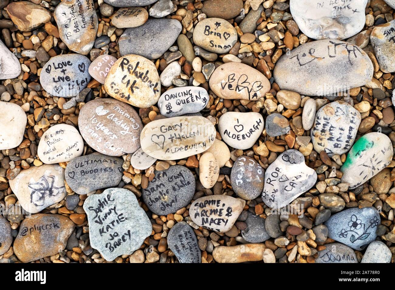 Messages written on stones on Aldeburgh Beach, Aldeburgh, Suffolk Stock Photo