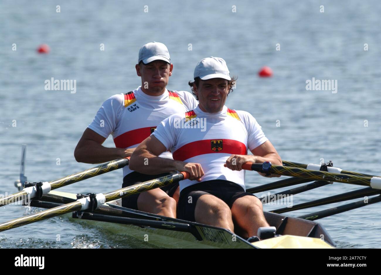 20040817 Olympic Games Athens Greece [Rowing] Schinias - Photo Peter  Spurrier GER M2- Bow Rene Bertram and Christian Schreiberg , moves away  from the start in his afternoon repechage. [ Covered head -
