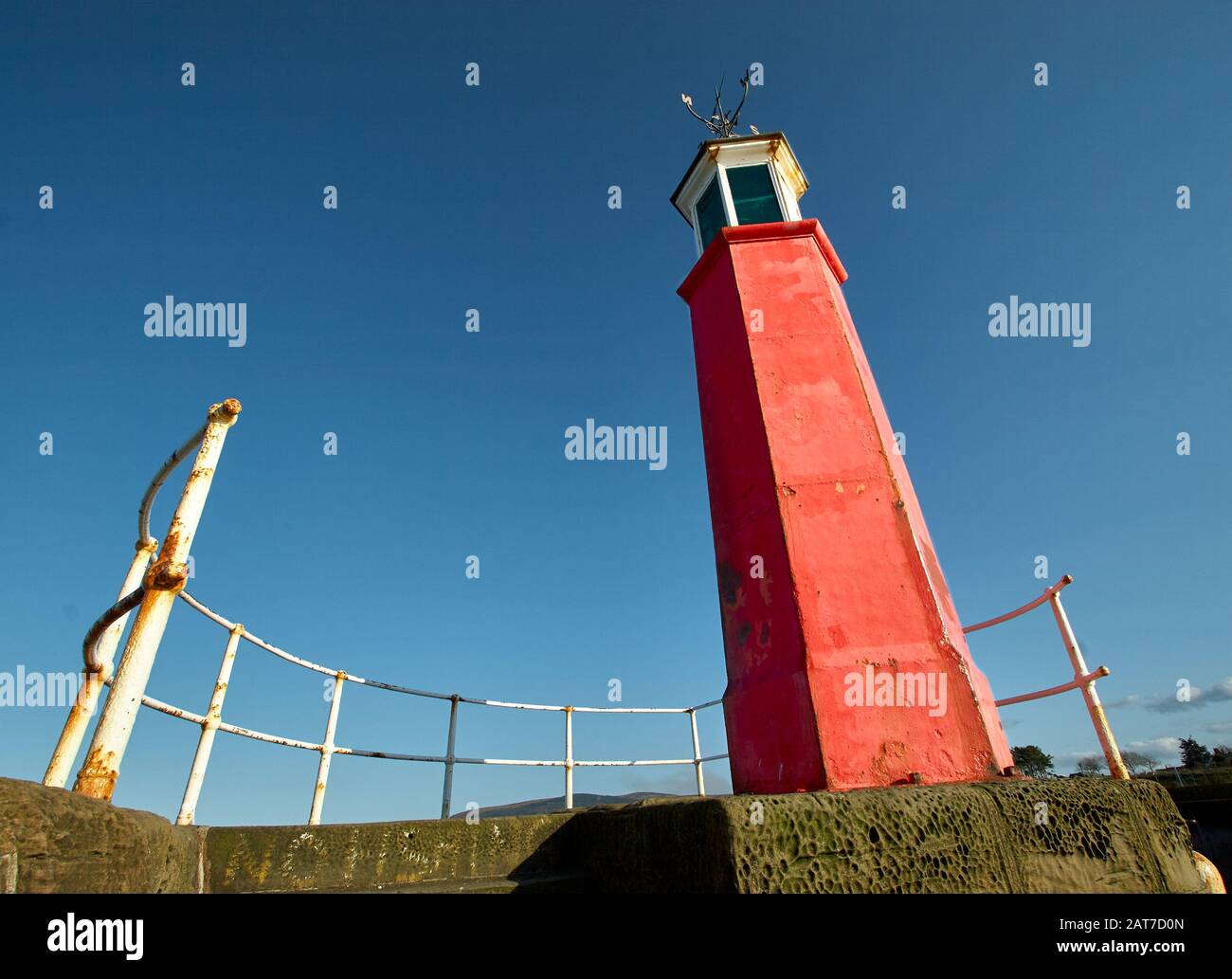 Lighthouse guarding the entrance to Watchet harbour on the Somerset Jurassic coast UK Stock Photo