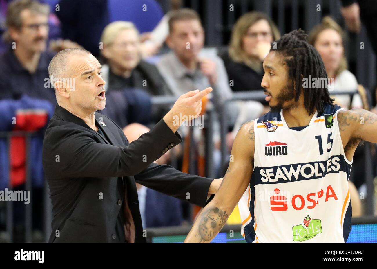 Rostock, Germany. 15th Jan, 2020. Dirk Bauermann (l), new coach of the Rostock  Seawolves, gestures at his home game premiere in the Stadthalle in the game  against VfL Kirchheim Knights, which the