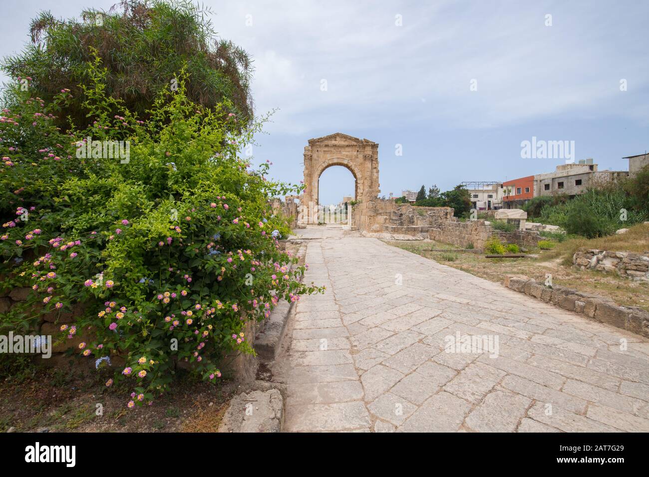 The arch of triumph and the Byzantine road. Roman remains in Tyre. Tyre is an ancient Phoenician city. Tyre, Lebanon - June, 2019 Stock Photo
