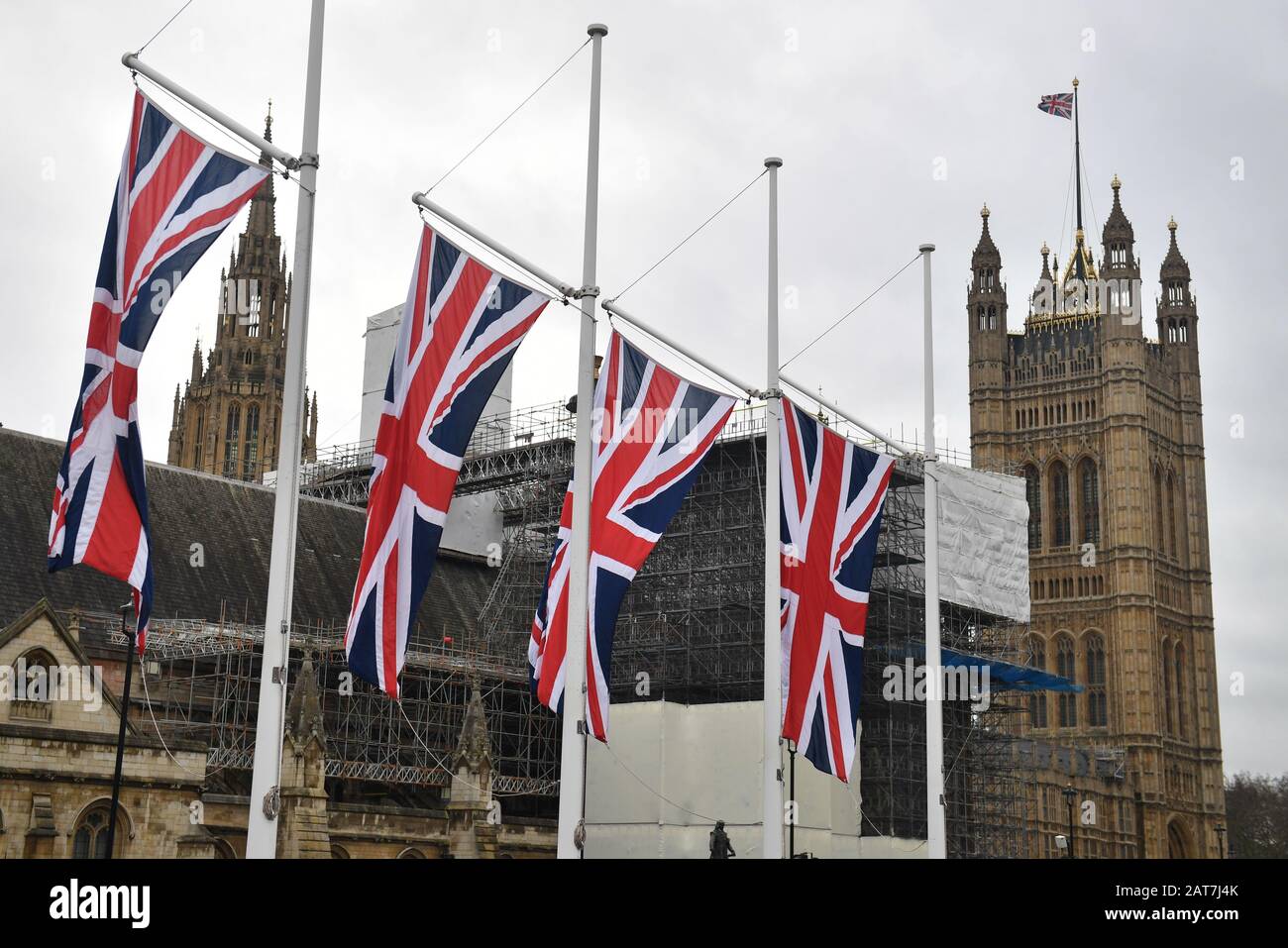 Union flags fly in Parliament Square, London, ahead of the UK leaving the European Union at 11pm on Friday. Stock Photo