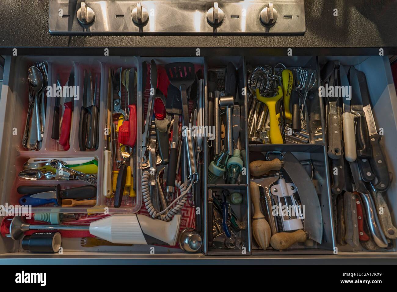 Drawer with many different kitchen utensils, Bavaria, Germany Stock