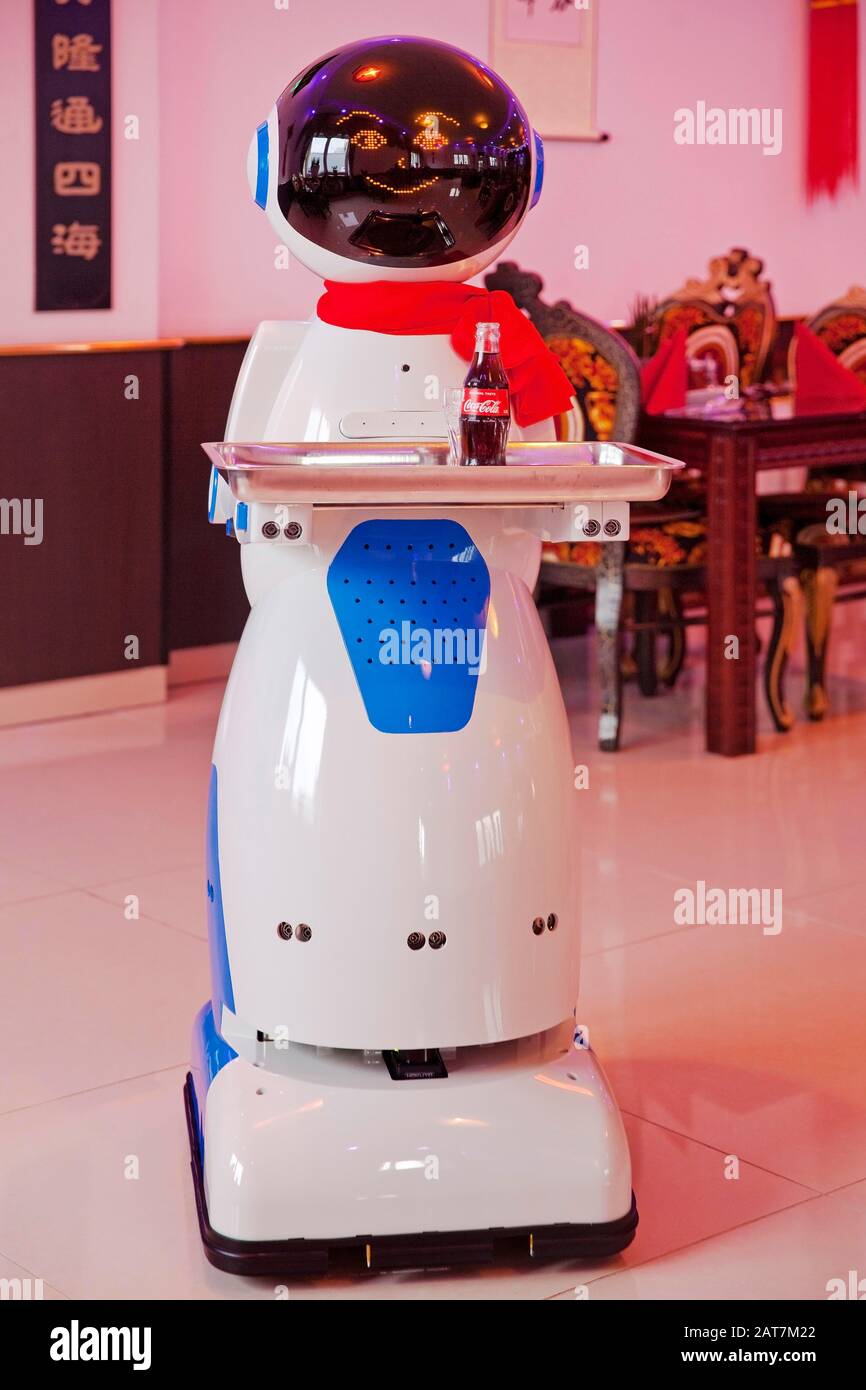 Catering service robot with a tray in a Chinese restaurant, Germany Stock Photo
