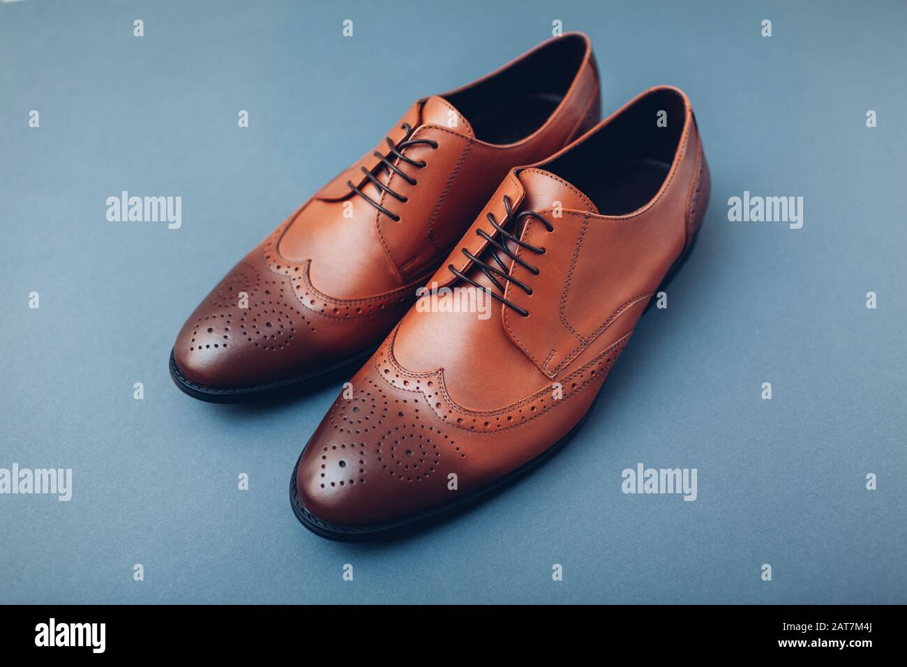 Oxford male brogues shoes. Men's fashion. Classical brown leather footwear  Stock Photo - Alamy