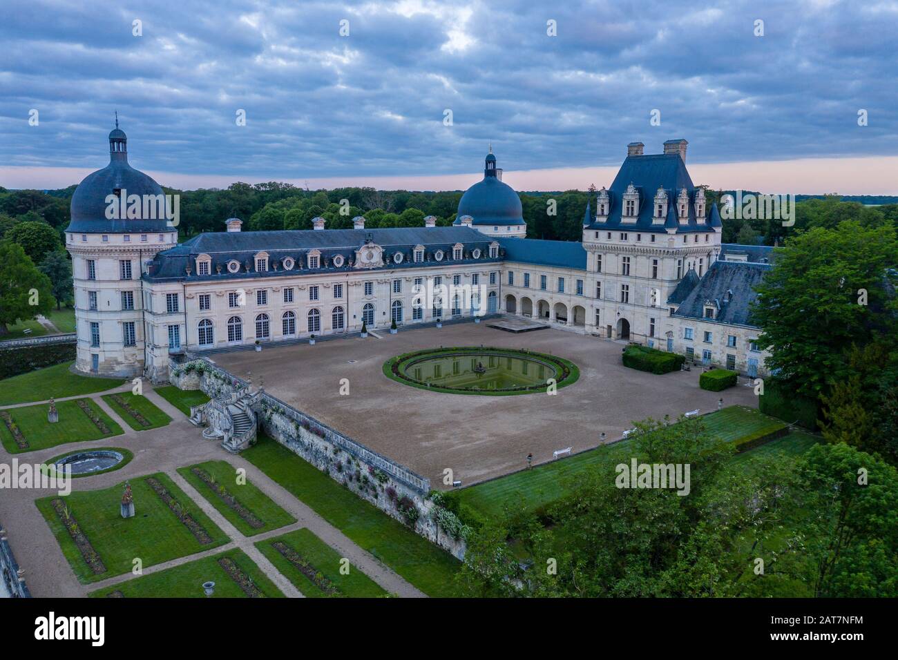 France, Indre, Berry, Valencay, Chateau de Valencay Park and Gardens, castle courtyard and the Jardin de la Duchesse in spring (aerial view) // France Stock Photo