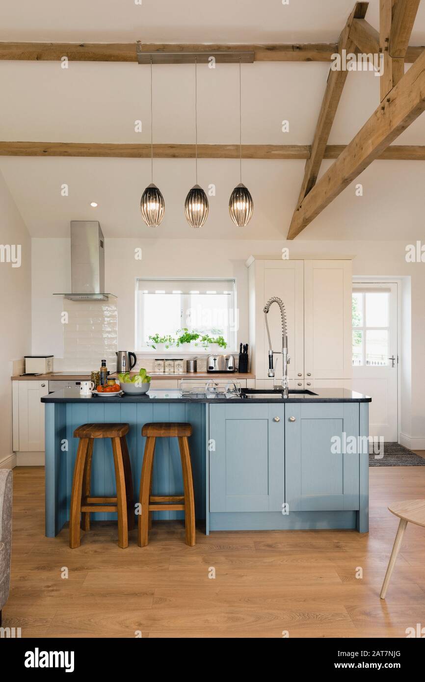 A wide-view shot of a modern kitchen in Northeastern England. Stock Photo