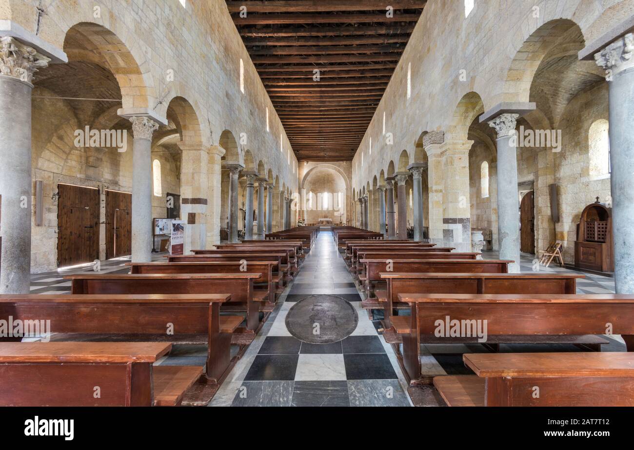 Central nave at Basilica Romanica di San Gavino, 1080, Romanesque style church in Porto Torres, Sassari province, Sardinia, Italy Stock Photo