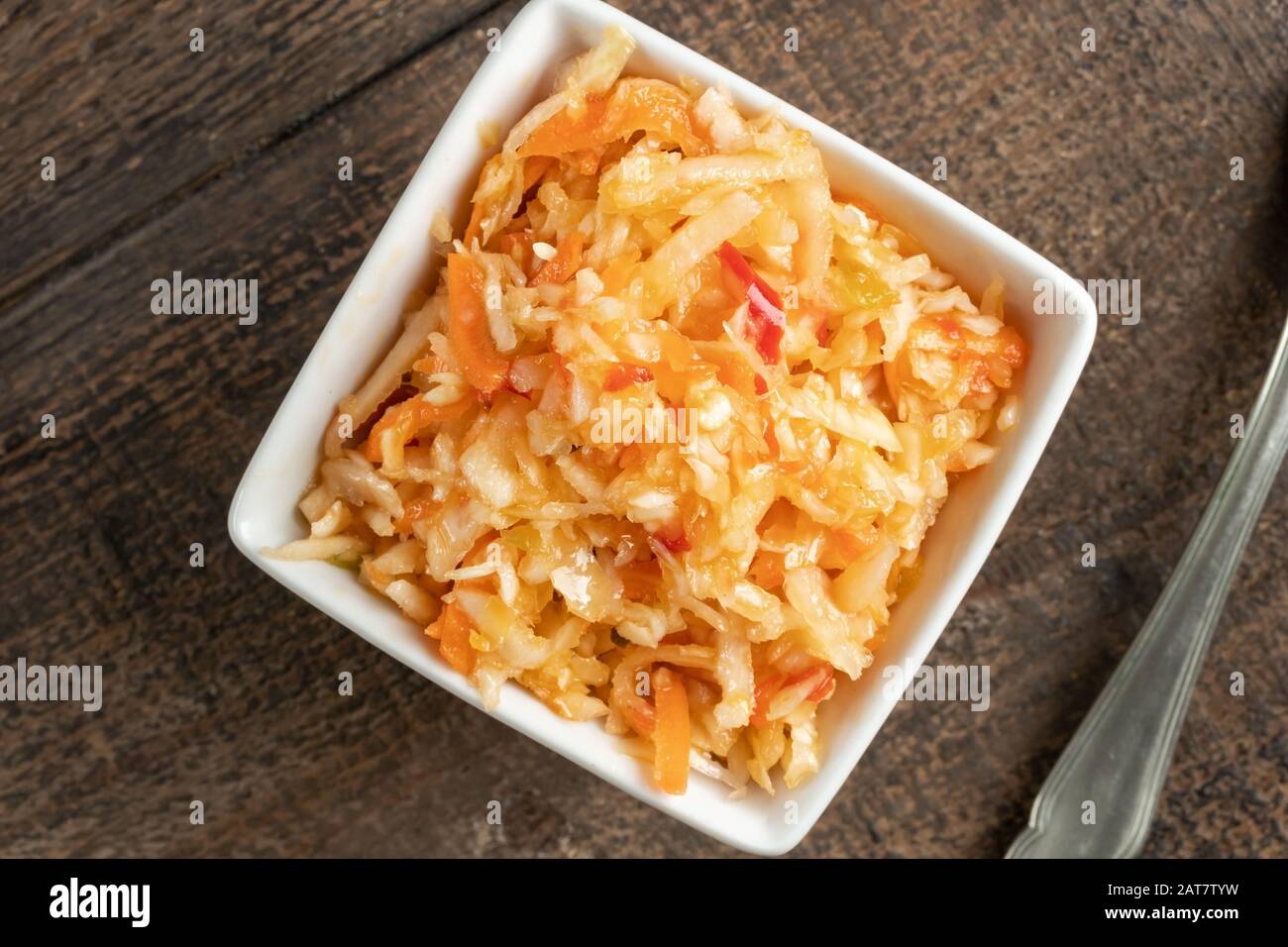 Fermented cabbage and carrots in a square bowl Stock Photo Alamy