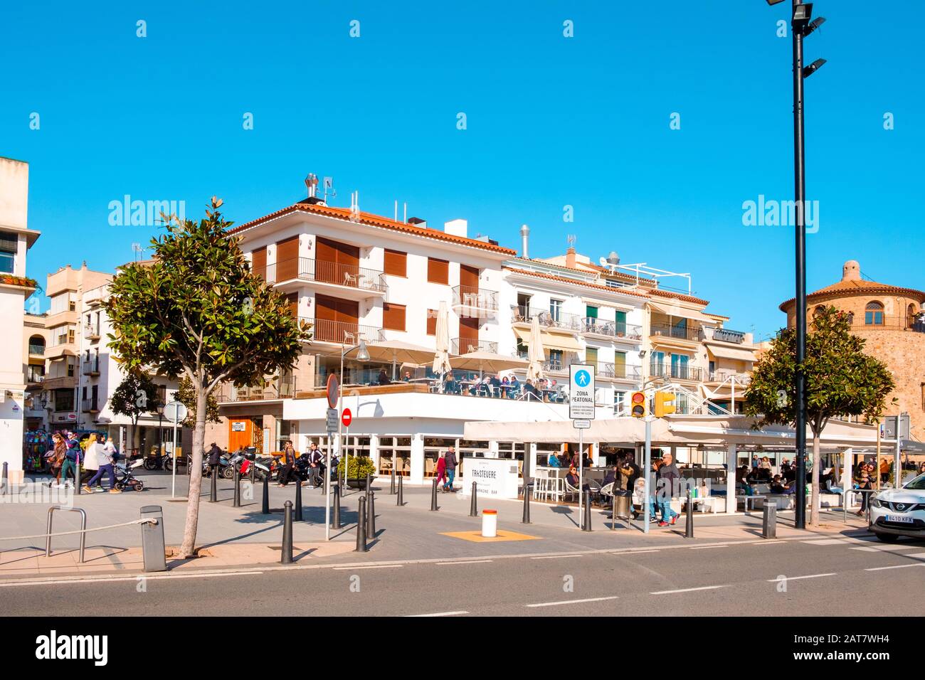 CAMBRILS, SPAIN - JANUARY 26, 2020: A view over the seafront of Cambrils, in the famous Costa Daurada coast, Spain, highlighting a medieval round towe Stock Photo
