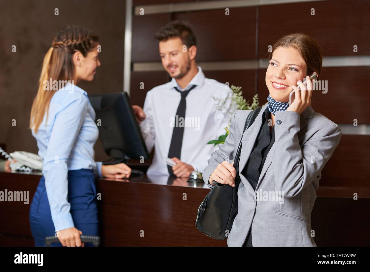 Concierge Services Guests At The Hotel At The Front Desk Stock Photo Alamy
