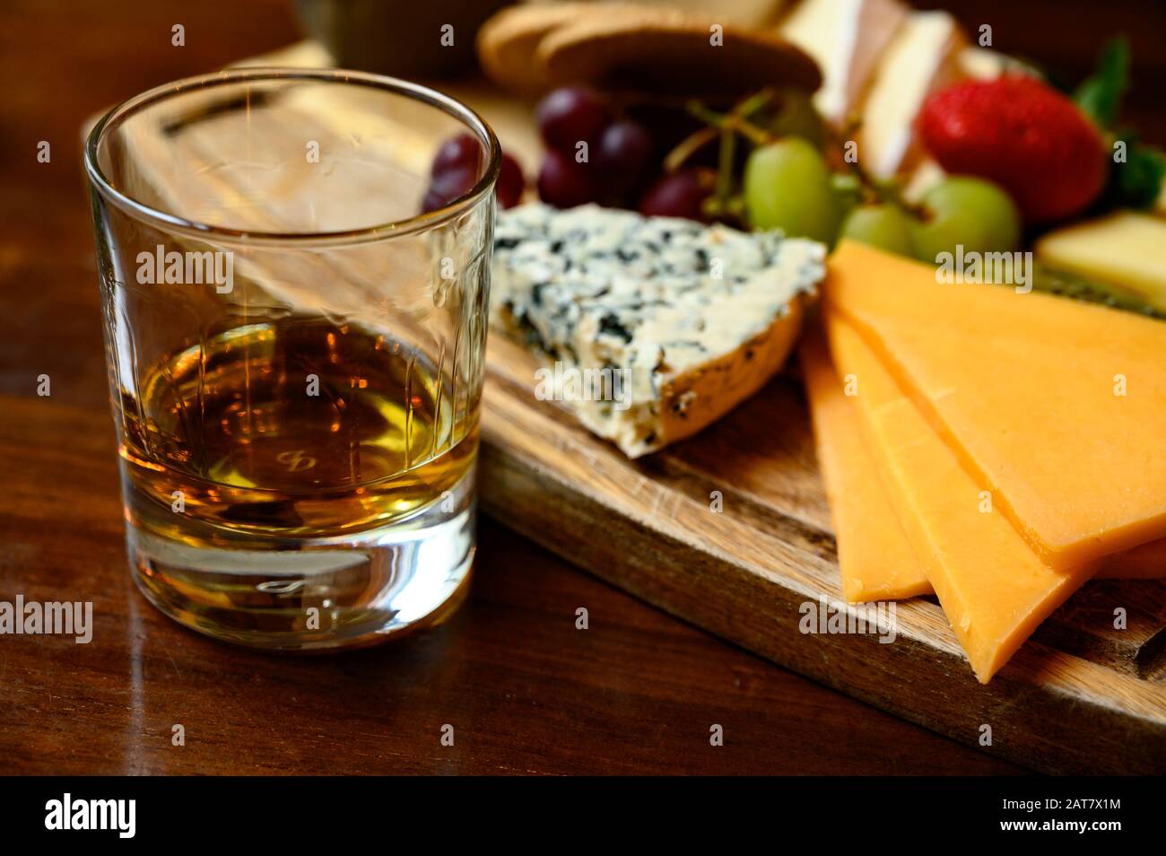 Tasting of original scottish cheese and whisky, plate with scottish