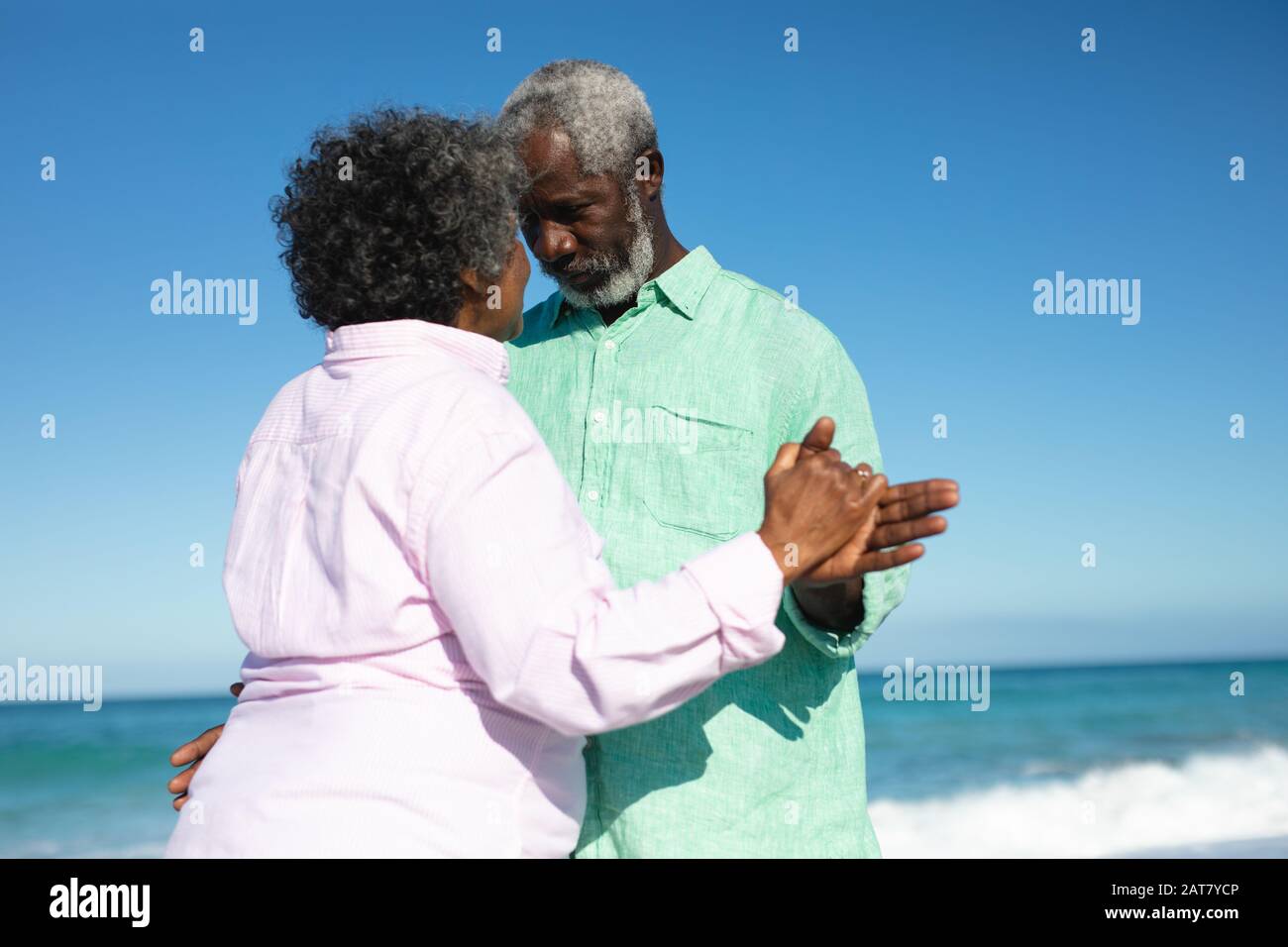 Old couple in love at the beach Stock Photo