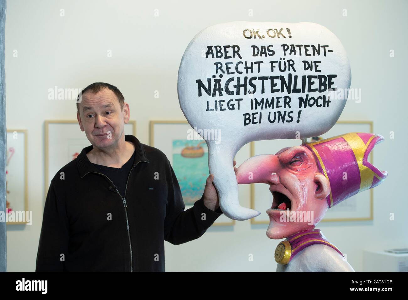 Jacques TILLY, caricaturist, satirist, car builder poses at the sculpture of a cardinal, criticism of religion, press conference on the occasion of the exhibition 'Jacques Tilly, Aì Politics and Provocation, Aì Caricatures XXL' in the LUDWIGGALERIE Schloss Oberhausen, on 30.01.2020, ¬ | usage worldwide Stock Photo