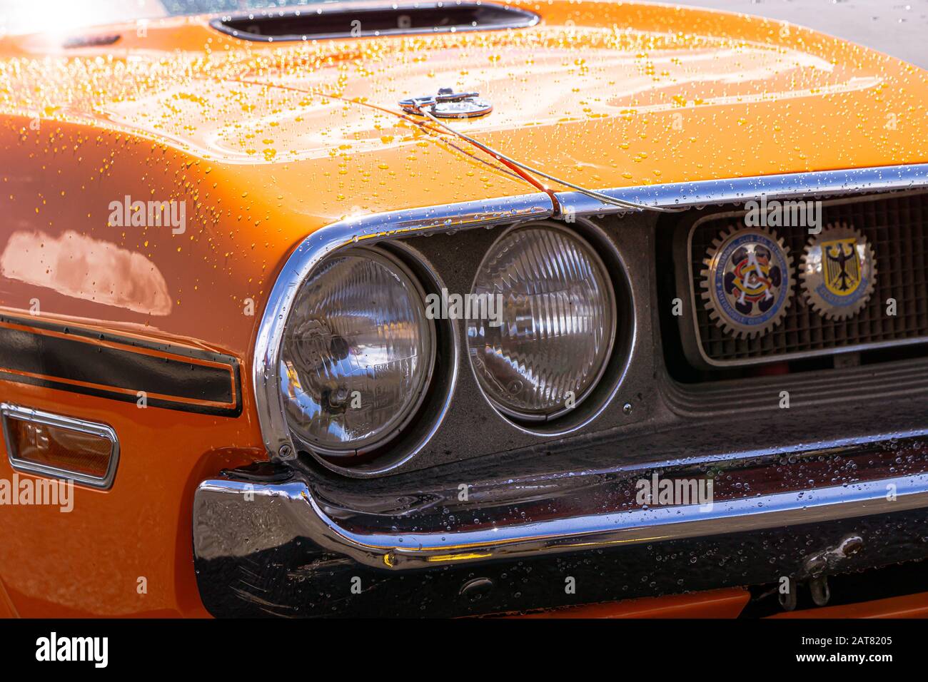 Bright orange American muscle car detail Stock Photo